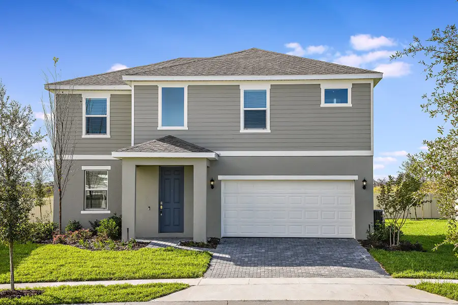Front exterior of a home in the Tarpon Bay community, located in Haines City, FL (Image 11).