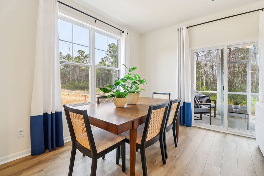 Enjoy natural light and backyard views while you dine