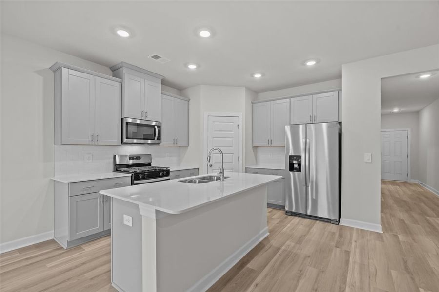 Furnished interior in a model home at Holland Park in Spartanburg (Image 5).