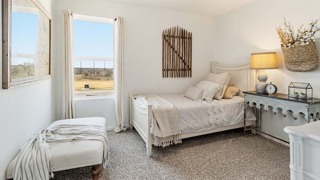 Furnished interior in a model home at Hickory Ridge in Elmendorf (Image 33).