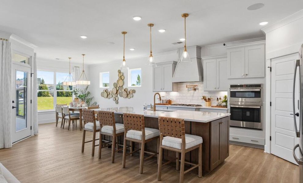 Furnished interior in a model home at Arbordale Reserve in Elgin (Image 17).