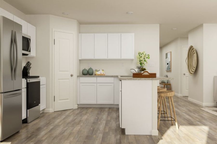 A kitchen with white cabinets. A kitchen with white cabinets.