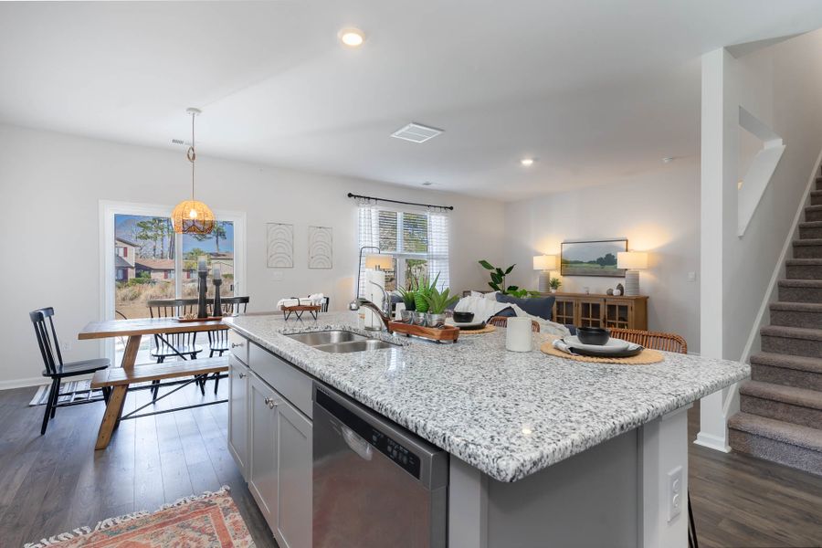 Furnished interior in a model home at Island Green in Myrtle Beach (Image 26).