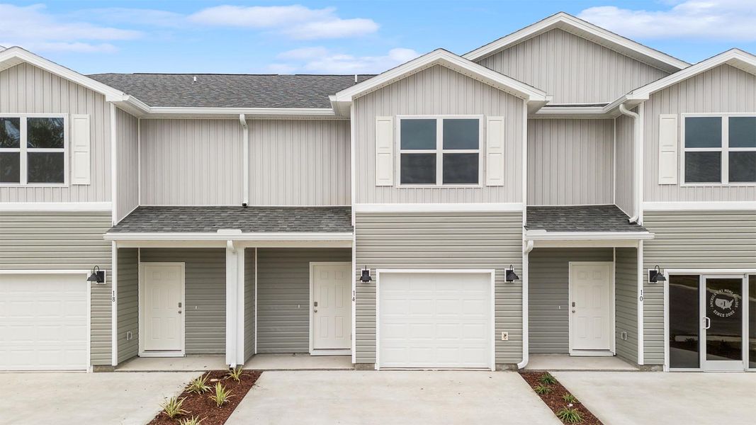 Front exterior of a home in the Genoa Landing Townhomes community, located in Freeport, FL (Image 3).