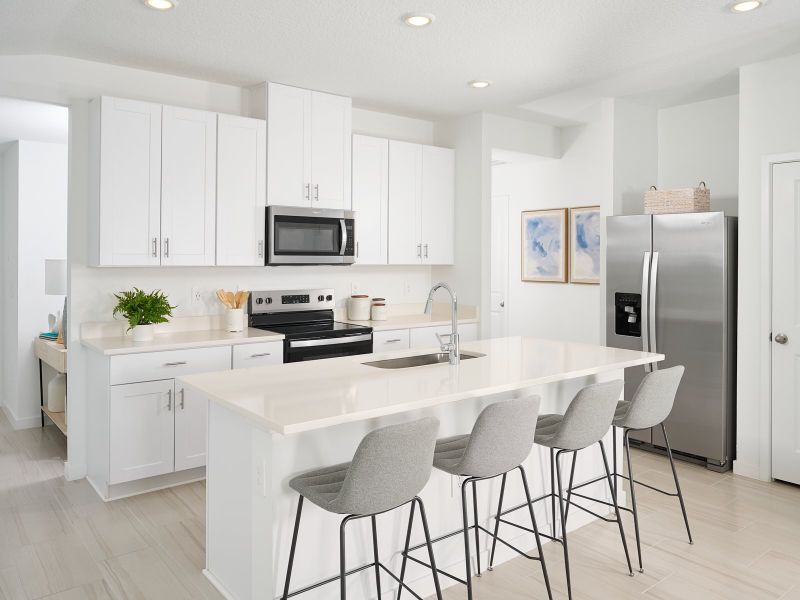 JAX_Flagler Village_Acadia_Kitchen_8 Sandy LN_Model.jpg