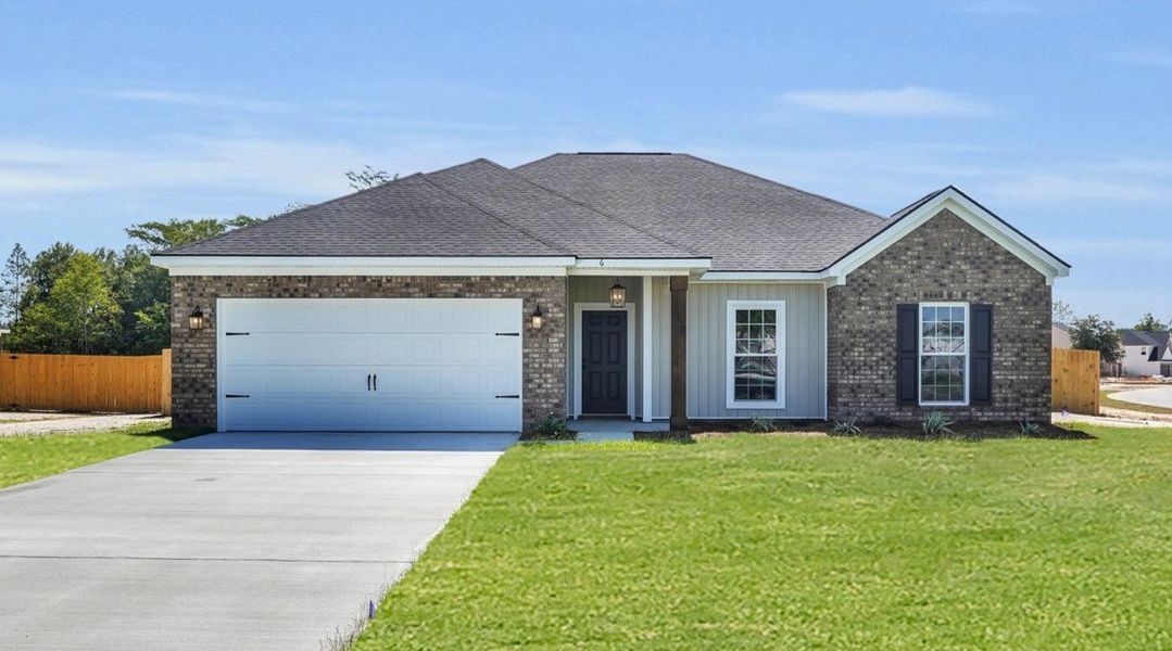 Front exterior of a home in the Doctor's Creek community, located in Ludowici, GA (Image 1).