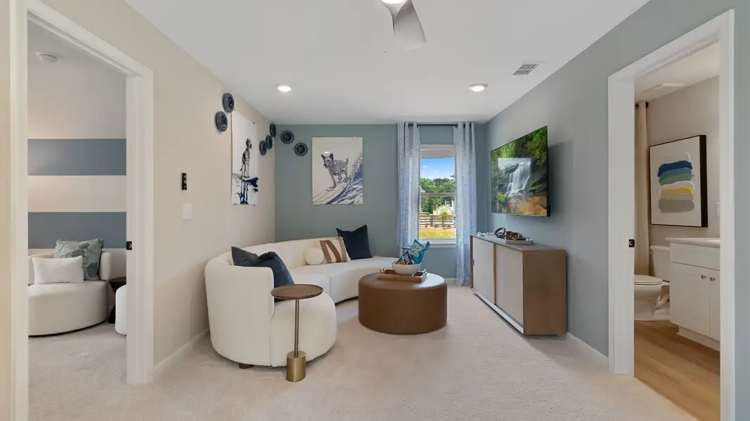 Furnished interior in a model home at Abbotts Crossing in Conyers (Image 6).