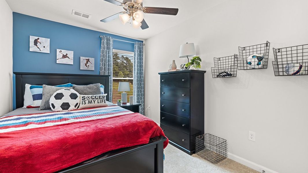 Furnished interior in a model home at The Parish at Flat Rock Townhomes in Graniteville (Image 18).