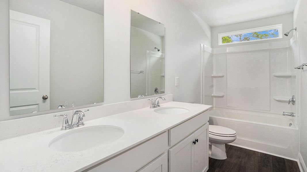 Furnished interior in a model home at Spring View Landing in Loris (Image 18).