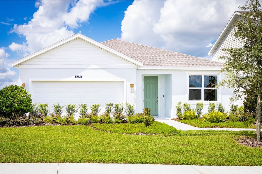 Front exterior of a home in the Hodges Reserve community, located in Howey-in-the-Hills, FL (Image 4).