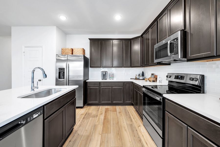Furnished interior in a model home at The Village at Elm Creek in Troy (Image 9).