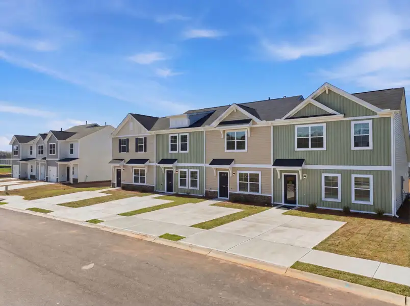 Front exterior of a home in the Towns at Lake Greenwood community, located in Greenwood, SC (Image 11).