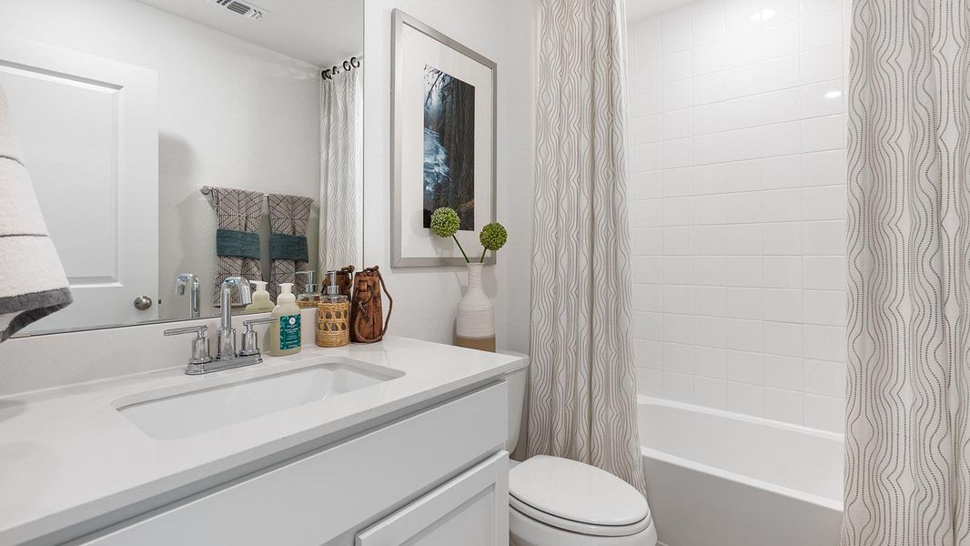 Furnished interior in a model home at Riverview in Georgetown (Image 40).