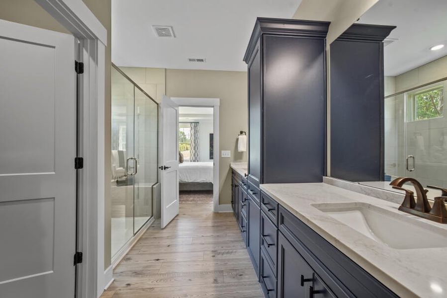 Furnished interior in a model home at Twin Creek Forsyth in Kernersville (Image 14).