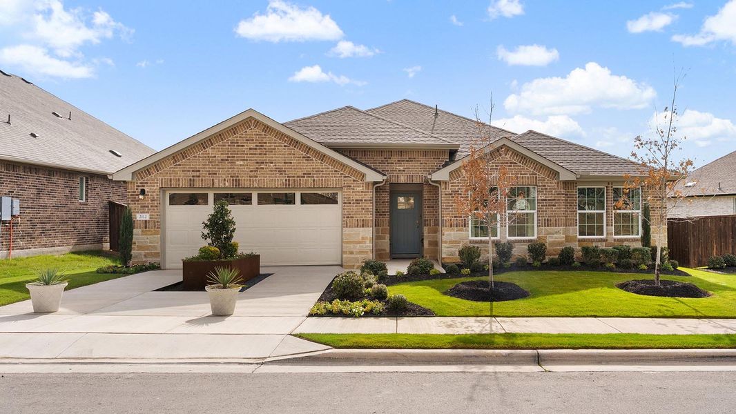 Front exterior of a home in the Riverview community, located in Georgetown, TX (Image 3).