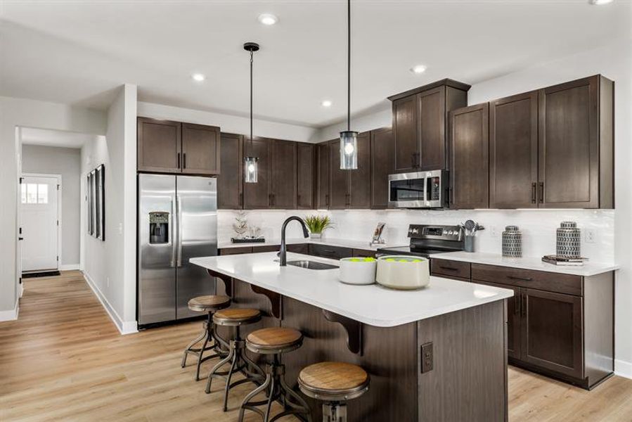 An open-concept main level allows for natural light and beautiful design. An open-concept main level allows for natural light and beautiful design.