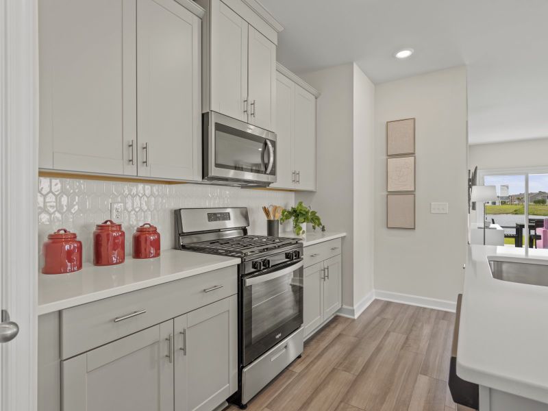 Designer curated finishes and plenty of counter space.