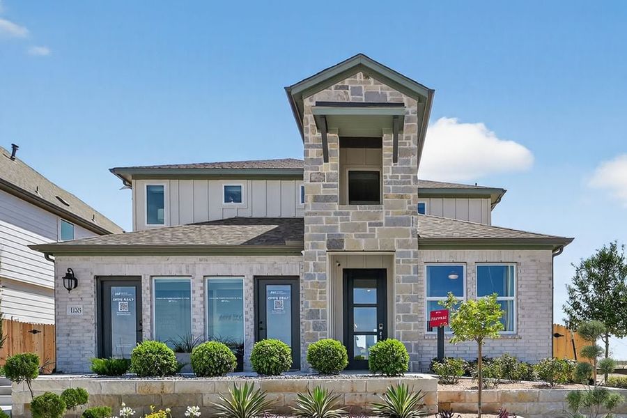 Front exterior of a home in the Turners Crossing community, located in Austin, TX (Image 2).