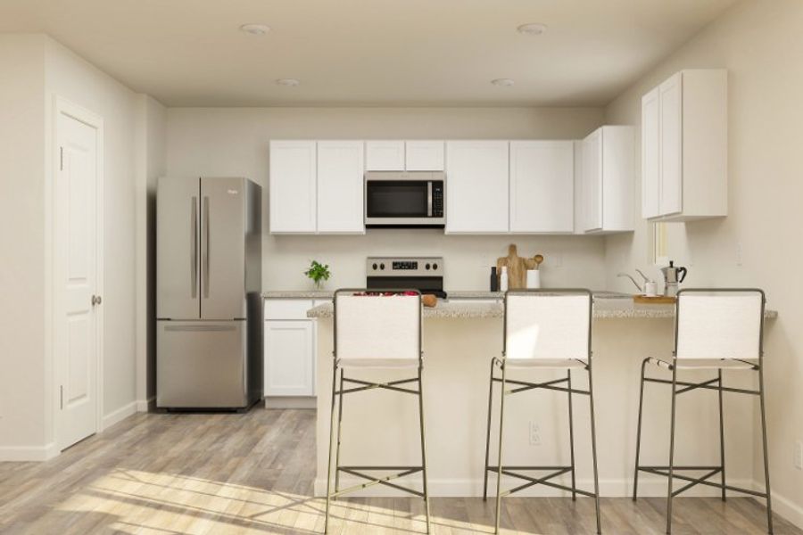 A kitchen with white cabinets. A kitchen with white cabinets.