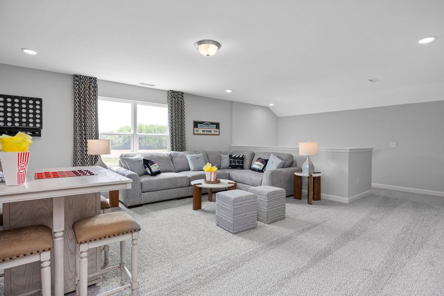 Furnished interior in a model home at Ashland in New Hill (Image 55).