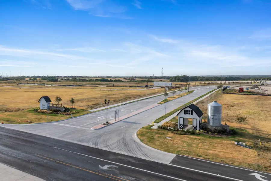 Entrance to the Redden Farms community in Midlothian, TX, featuring signage and landscaping (Image 4).