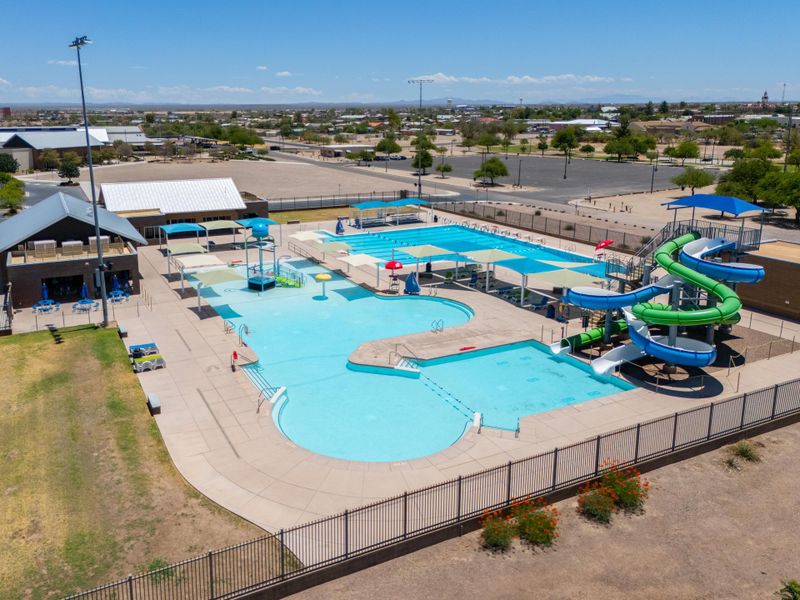 A swimming pool with a slide.