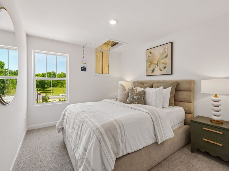 Furnished interior in a model home at Rocky River Towns in Charlotte (Image 16).