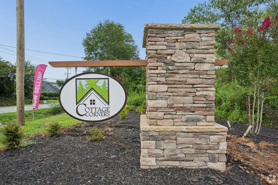 Entrance to the Cottage Corners community in Taylors, SC, featuring signage and landscaping (Image 2). Entrance to the Cottage Corners community in Taylors, SC, featuring signage and landscaping (Image 2).