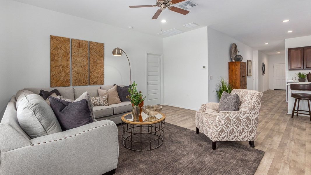 Furnished interior in a model home at Roadrunner Estates in Tucson (Image 12).