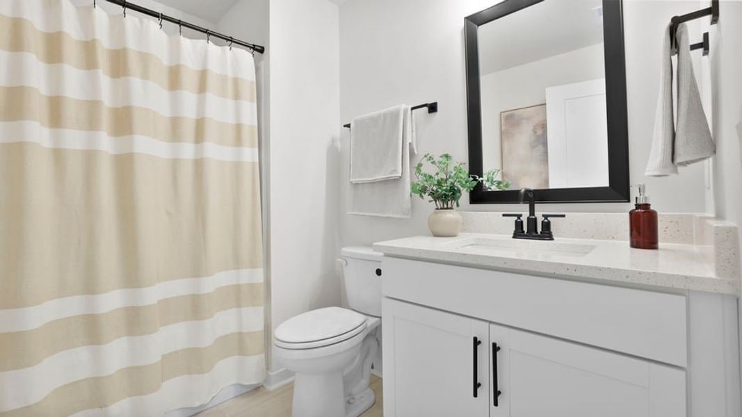 Furnished interior in a model home at Sycamore Cove in Woodruff (Image 64).