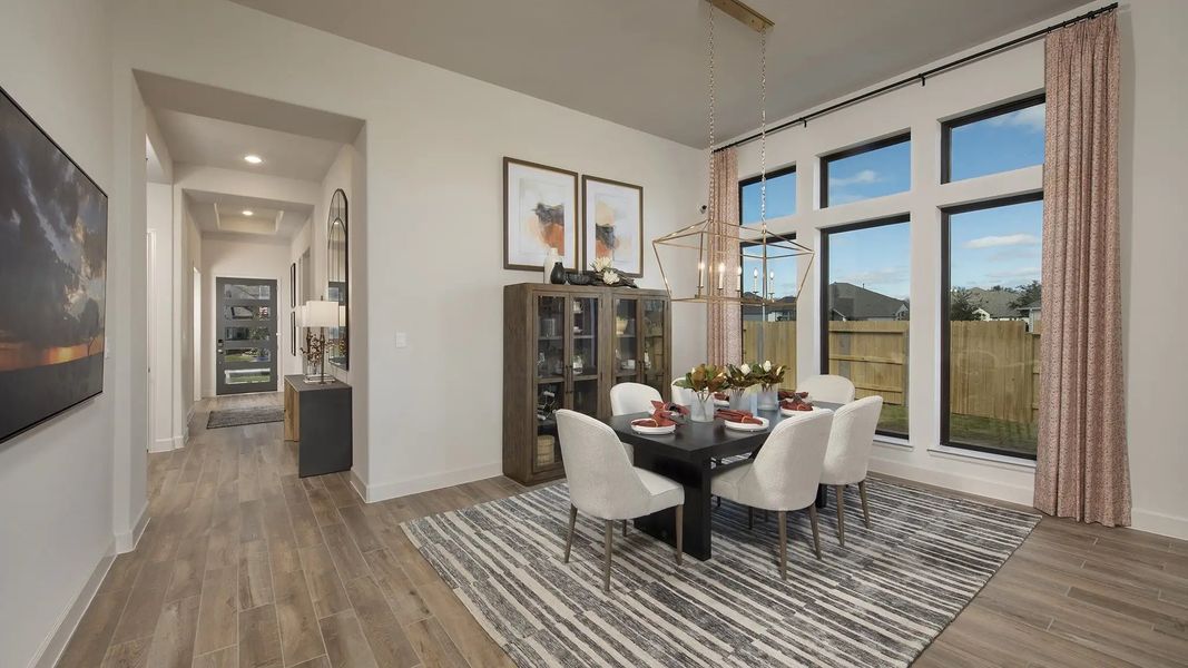 Furnished interior in a model home at Lakes Of Cane Island 60' in Katy (Image 7).