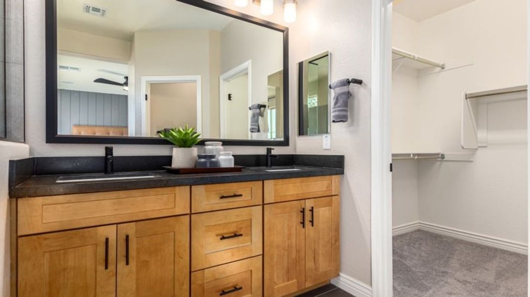 Furnished interior in a model home at Alamar Encore Collection in Avondale (Image 22).