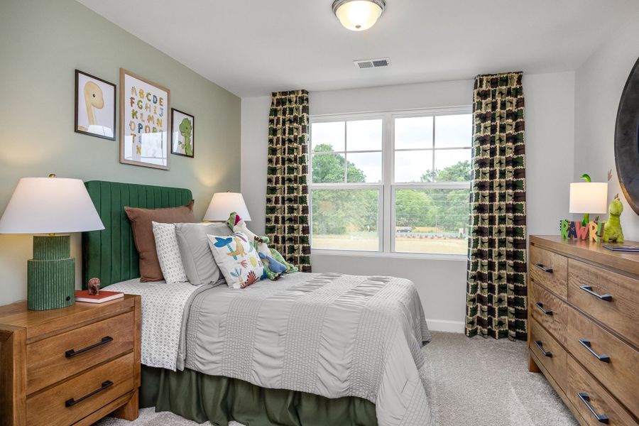 Furnished interior in a model home at Gregory Village Townhomes in Lillington (Image 40).