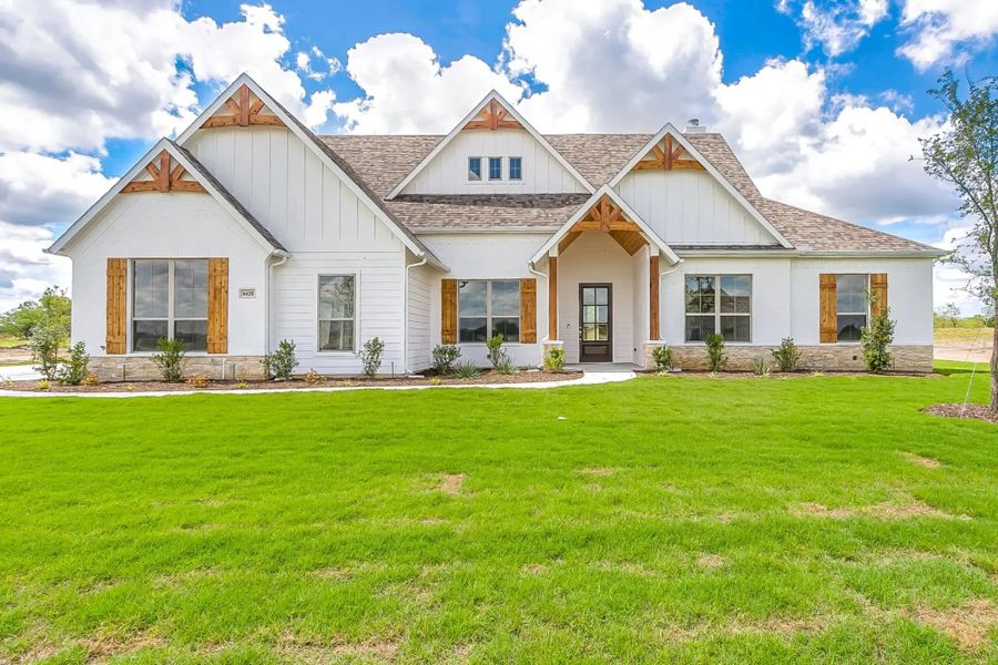 Front exterior of a home in the Cunningham Meadows community, located in Waxahachie, TX (Image 2). Front exterior of a home in the Cunningham Meadows community, located in Waxahachie, TX (Image 2).