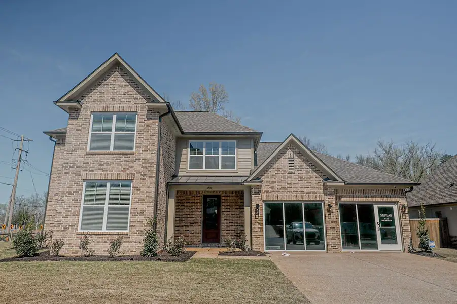 Front exterior of a home in the Walker Farms community, located in Bartlett, TN (Image 2).