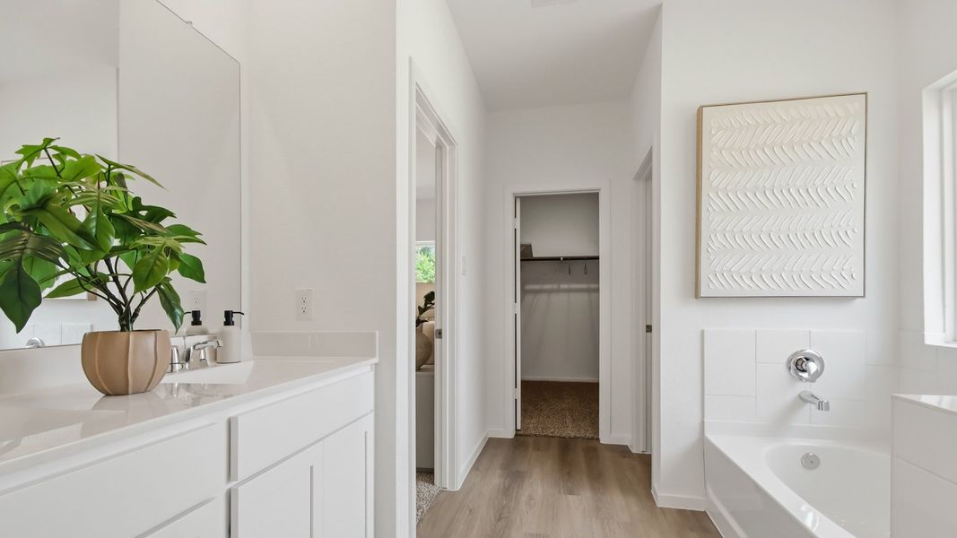 Furnished interior in a model home at East Williams Cove in Conroe (Image 19). Furnished interior in a model home at East Williams Cove in Conroe (Image 19).