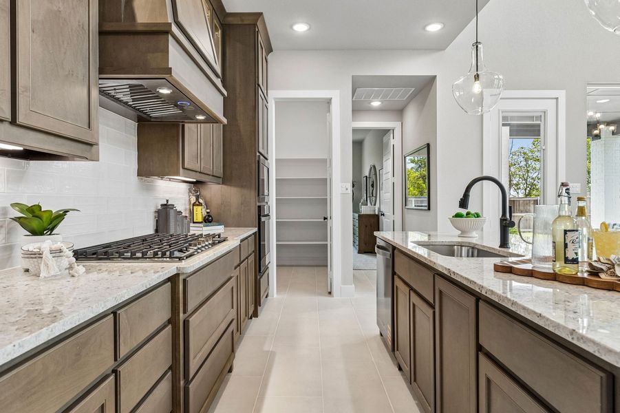 Front exterior of a home in the Parkmont – Timberbrook community, located in Justin, TX (Image 8).