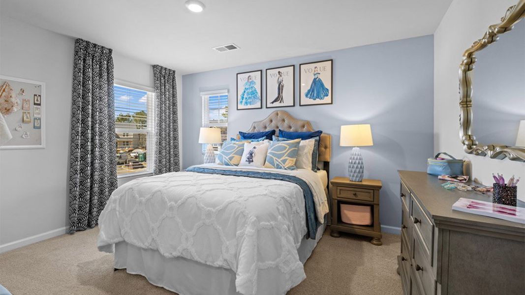 Furnished interior in a model home at Garden Lakes in Hampton (Image 12).