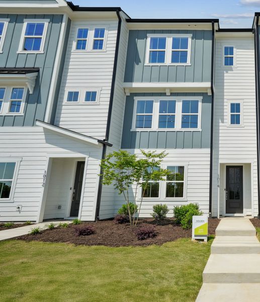 Front exterior of a home in the Twinleaf Townes community, located in Chapel Hill, NC (Image 5).