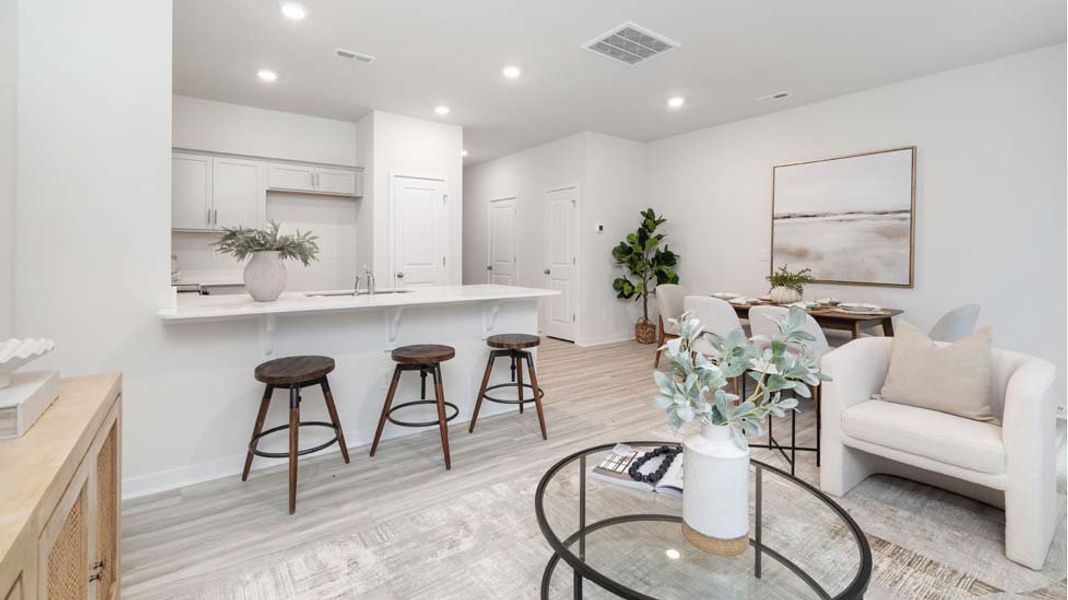 Furnished interior in a model home at The Townes at Troutman in Troutman (Image 9).
