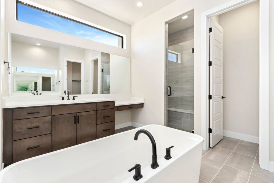 Furnished interior in a model home at Acadia at RainDance in Windsor (Image 15).