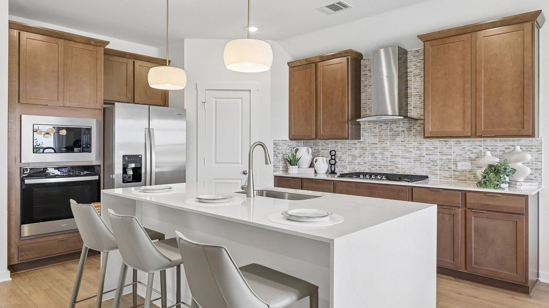 Furnished interior in a model home at Monarch Ranch in Manor (Image 9).