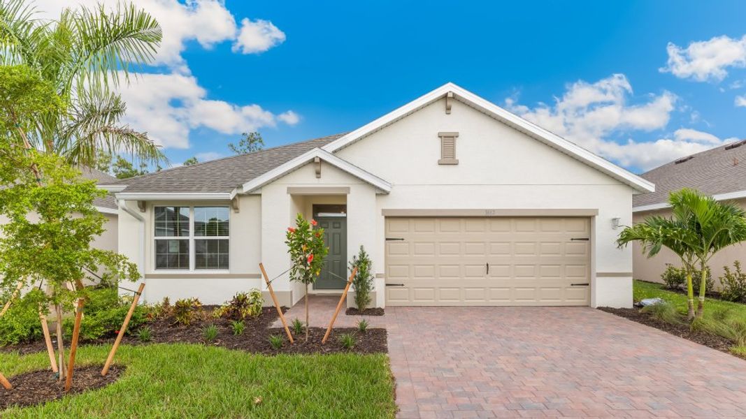 Front exterior of a home in the Seagrass - Express & Tradition community, located in Punta Gorda, FL (Image 18). Front exterior of a home in the Seagrass - Express & Tradition community, located in Punta Gorda, FL (Image 18).