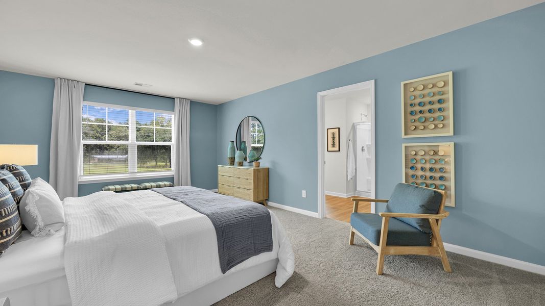 Furnished interior in a model home at The Cove at Mallard Crossing in Summerville (Image 32).