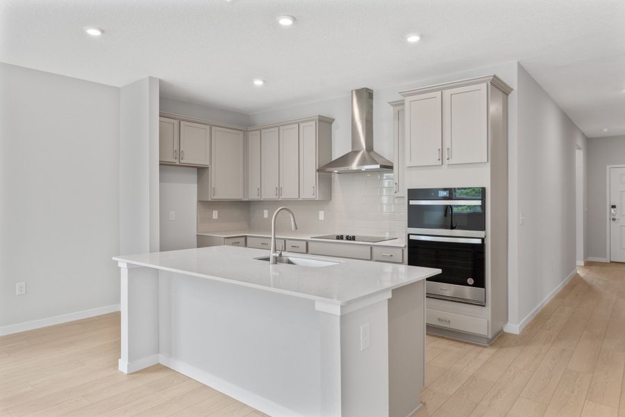 Charleston II Floorplan Lot 144 Chef's Kitchen with Gray Cabinets at Seminole Palms in Palm Coast Charleston II Floorplan Lot 144 Chef's Kitchen with Gray Cabinets at Seminole Palms in Palm Coast