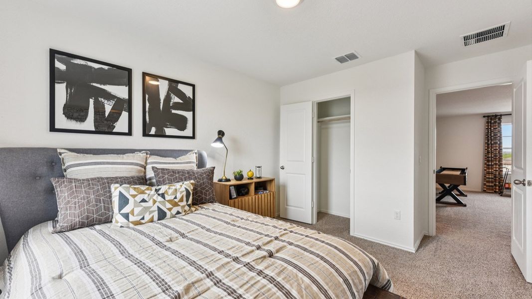 Furnished interior in a model home at Palomino in Manor (Image 43).