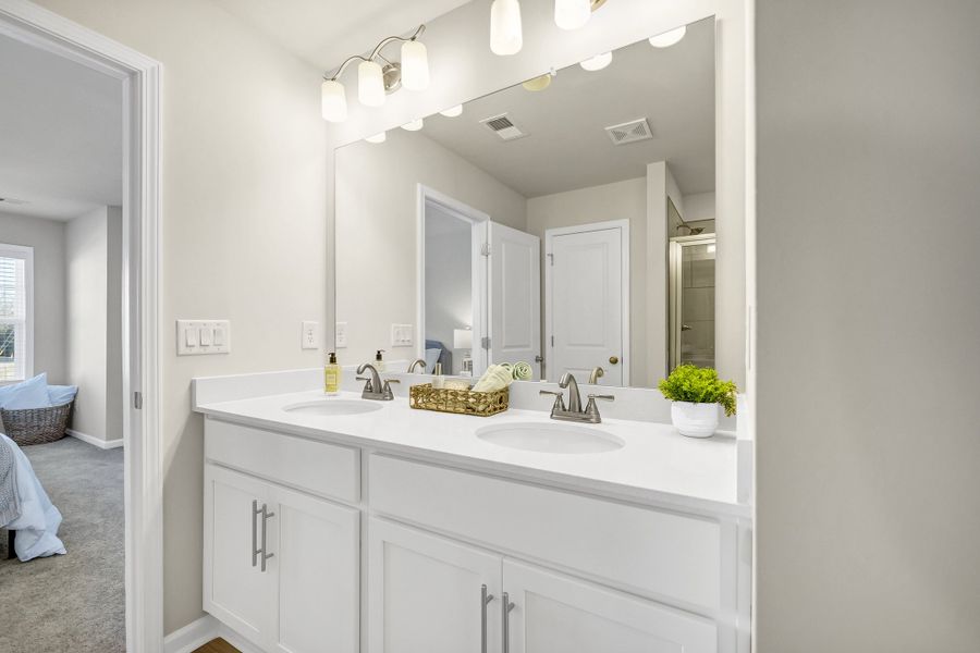 Furnished interior in a model home at Percival Village in Columbia (Image 23).