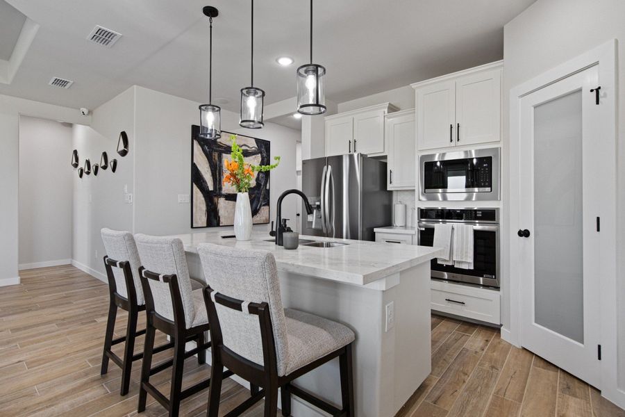 Furnished interior in a model home at Paloma Ranch in Harlingen (Image 6).