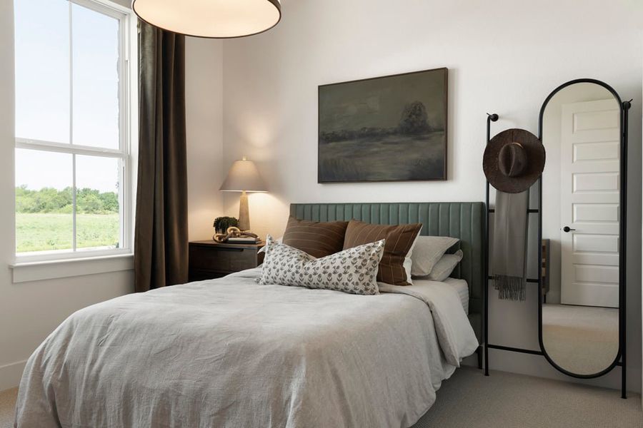 Furnished interior in a model home at Lagos Reserve in Manor (Image 24).