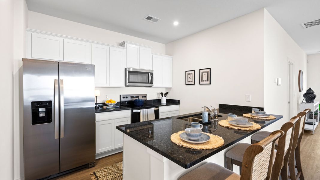 Furnished interior in a model home at Cambridge Cove in Chickamauga (Image 15).